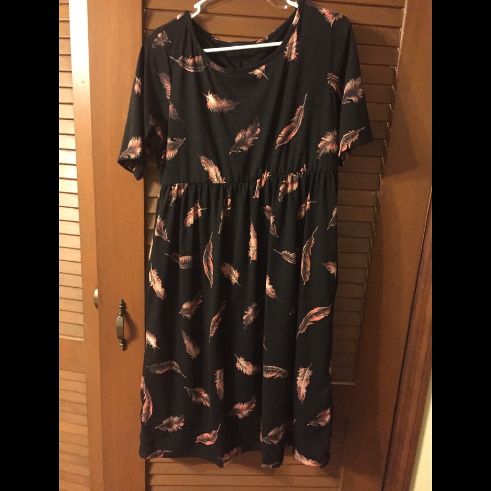 Dress with feather detail